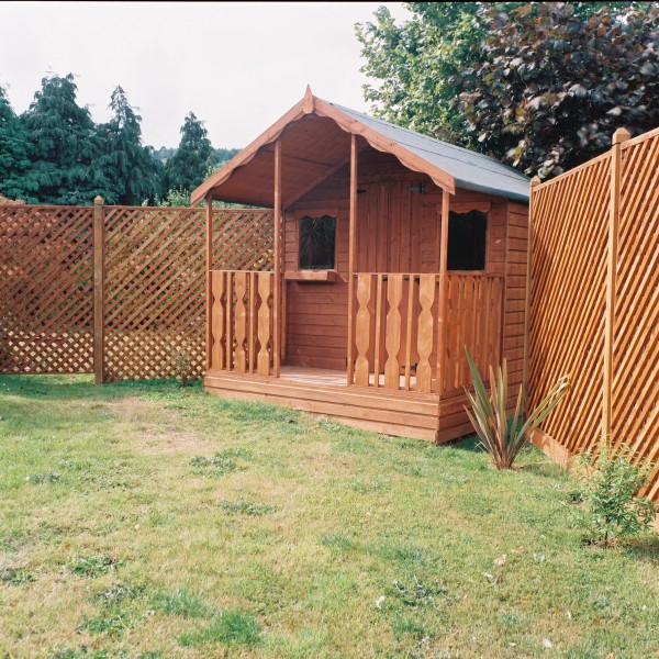 Wooden Lodge Garden Shed with fence